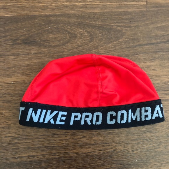 red nike skull cap